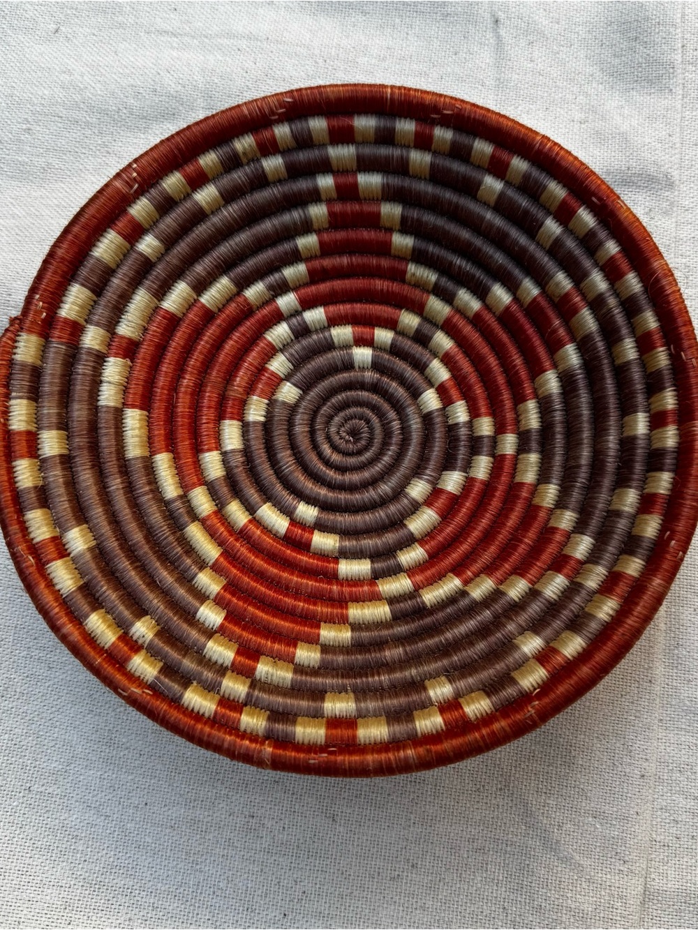 African hand-woven coil basket